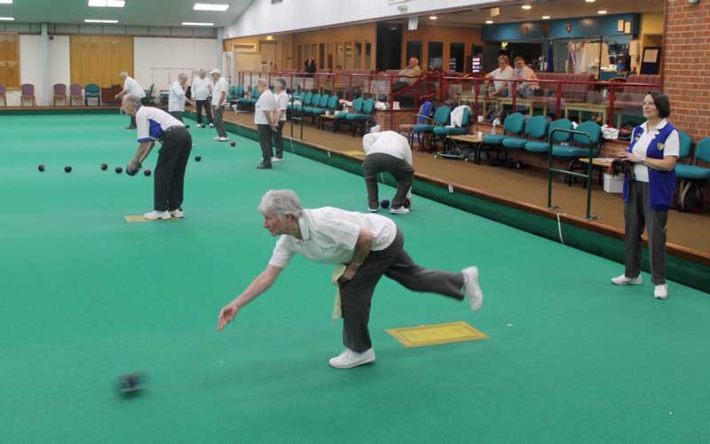 Bowlers on the rink at Tunbridge Wells Indoor Bowls Club